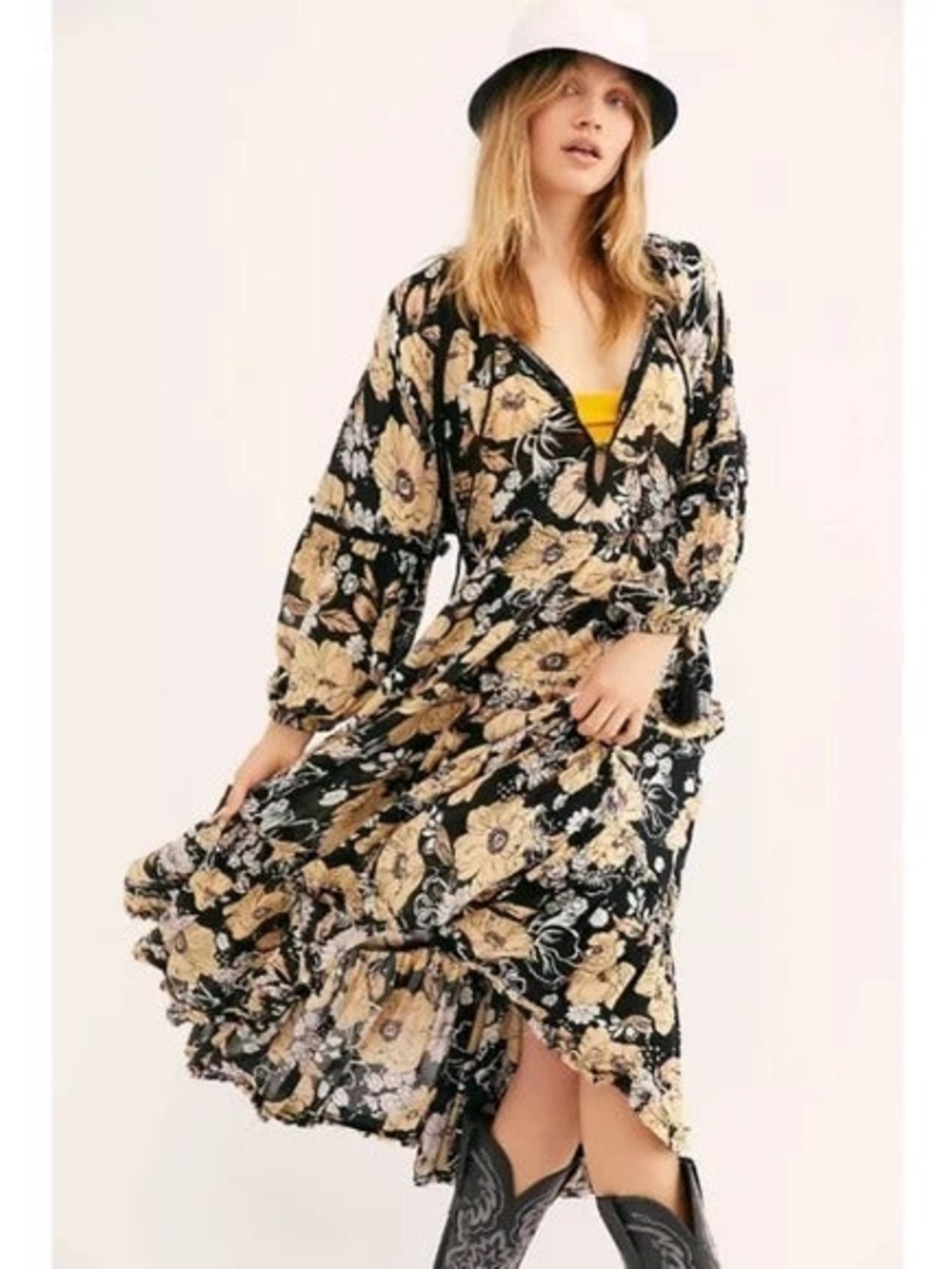 Free People Flowy printed maxi dress featuring ruffled details and crochet trim